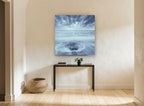 Stone in the Swirl coastal canvas print on the wall of a hallway