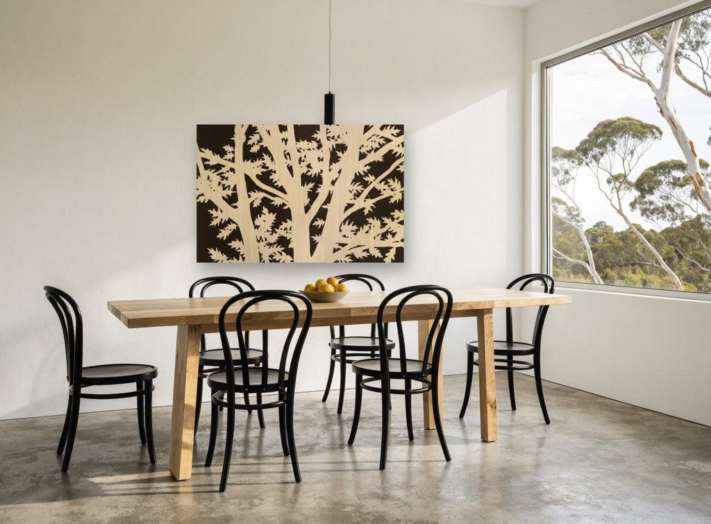 Oak Branch Silhouette floral canvas print on the wall of a dining room