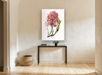 Pink Laelia Orchid Spray vintage canvas print on the wall of a hallway