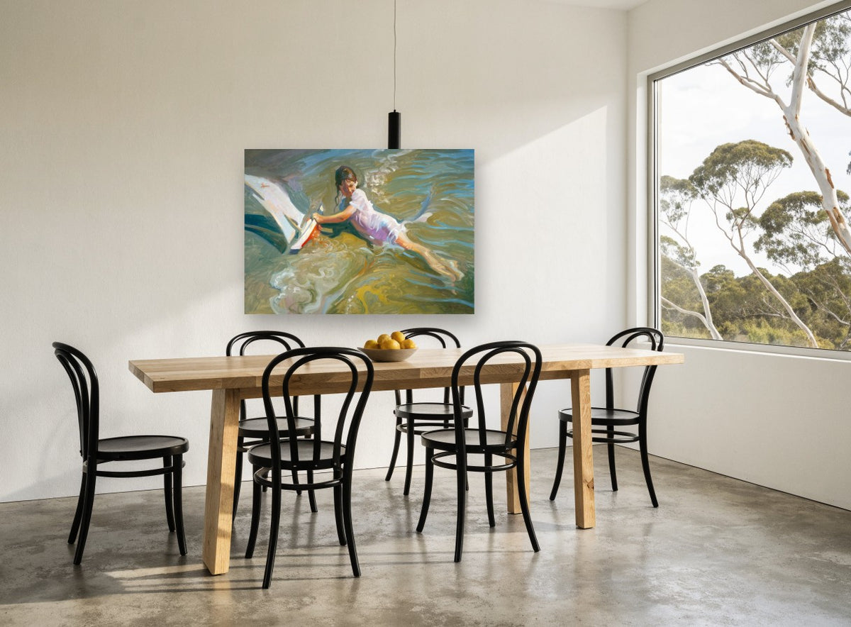 Girl Playing With Boat coastal canvas print on the wall of a dining room