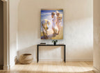 Women at the Water's Edge coastal canvas print on the wall of a hallway