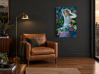 Girl Among Lilies floral canvas print on the wall of a charcoal living room