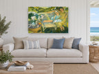 Reading in the Garden floral canvas print on the wall of a beach house living room