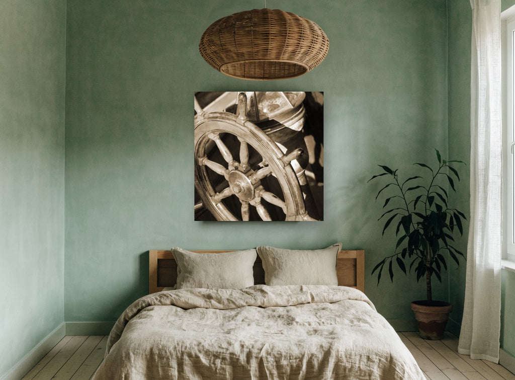 Sepia Helm Wheel coastal canvas print on the wall of a bedroom
