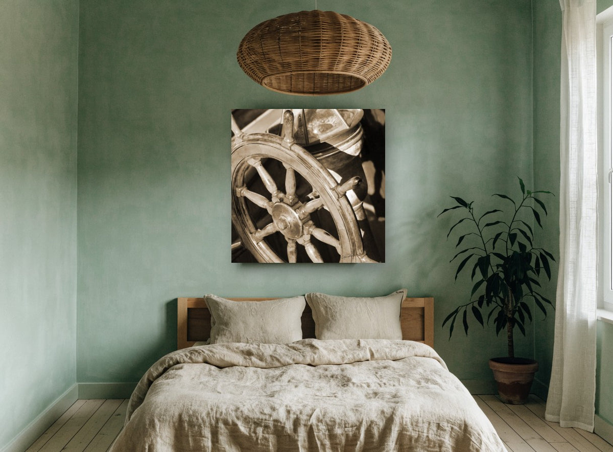 Sepia Helm Wheel coastal canvas print on the wall of a bedroom