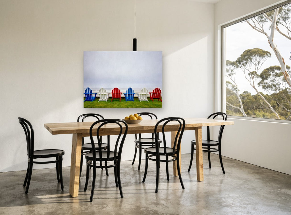 Chairs Facing the Mist coastal canvas print on the wall of a dining room