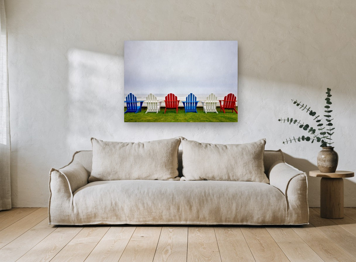 Chairs Facing the Mist coastal canvas print on the wall of a living room