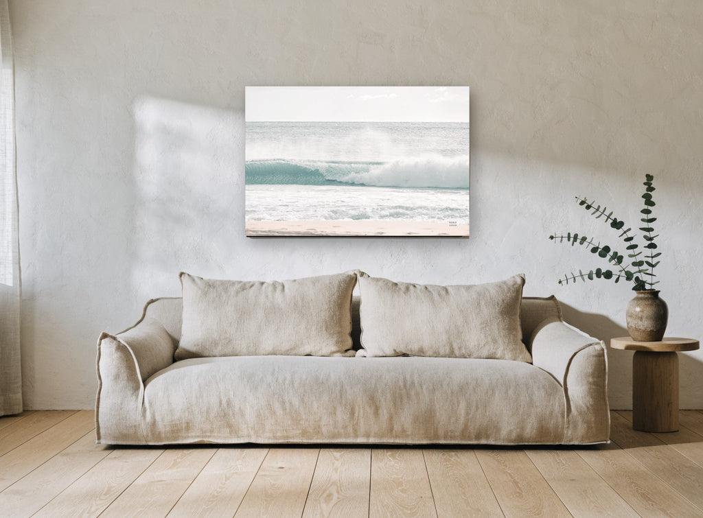 Soft Aqua Shorebreak coastal canvas print on the wall of a living room
