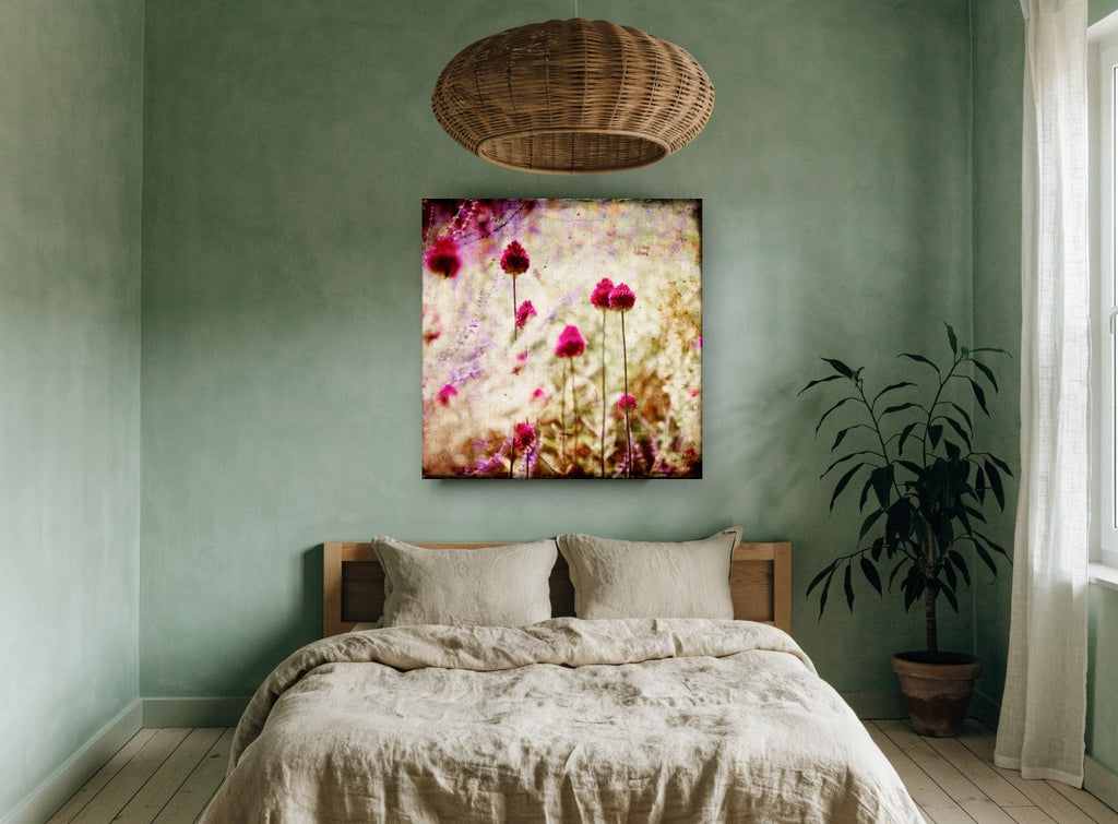 Magenta Allium Haze floral canvas print on the wall of a bedroom