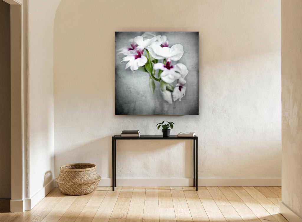 Soft Orchid Spray floral canvas print on the wall of a hallway