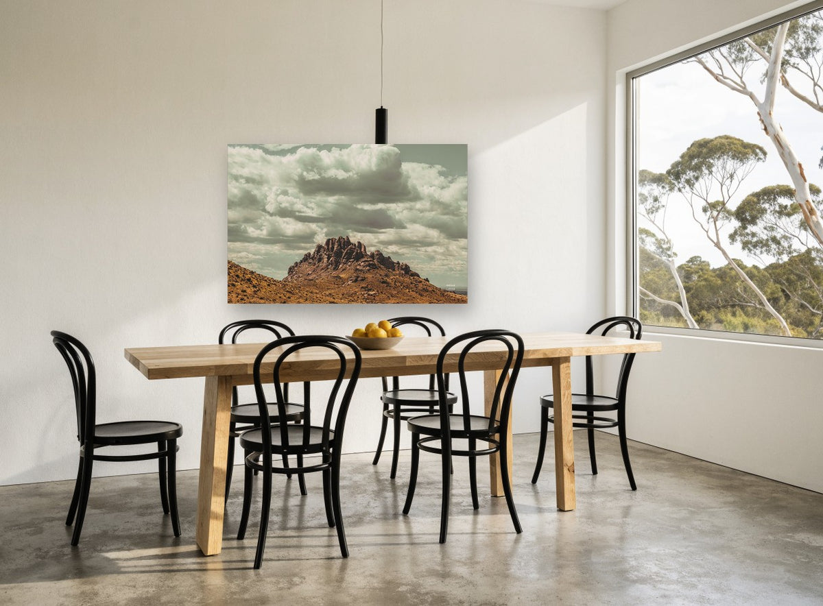 Rocky Peak Cloudscape landscape canvas print on the wall of a dining room