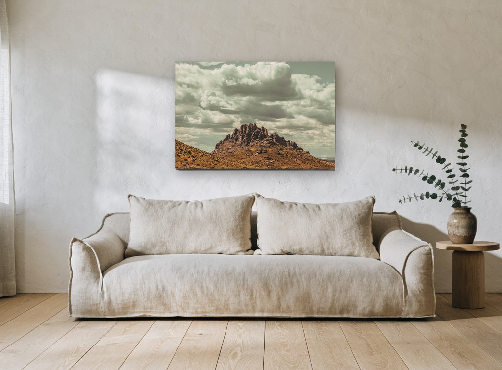Rocky Peak Cloudscape landscape canvas print on the wall of a living room