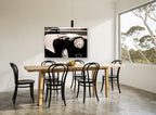 Chrome and Sepia Fender vintage canvas print on the wall of a dining room
