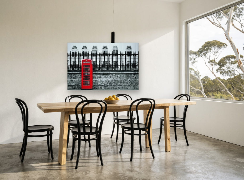 Red Box Against Railings city canvas print on the wall of a dining room