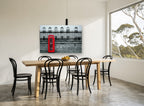 Red Box Against Railings city canvas print on the wall of a dining room