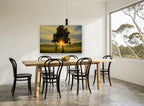 Sunrise Through the Tree landscape canvas print on the wall of a dining room