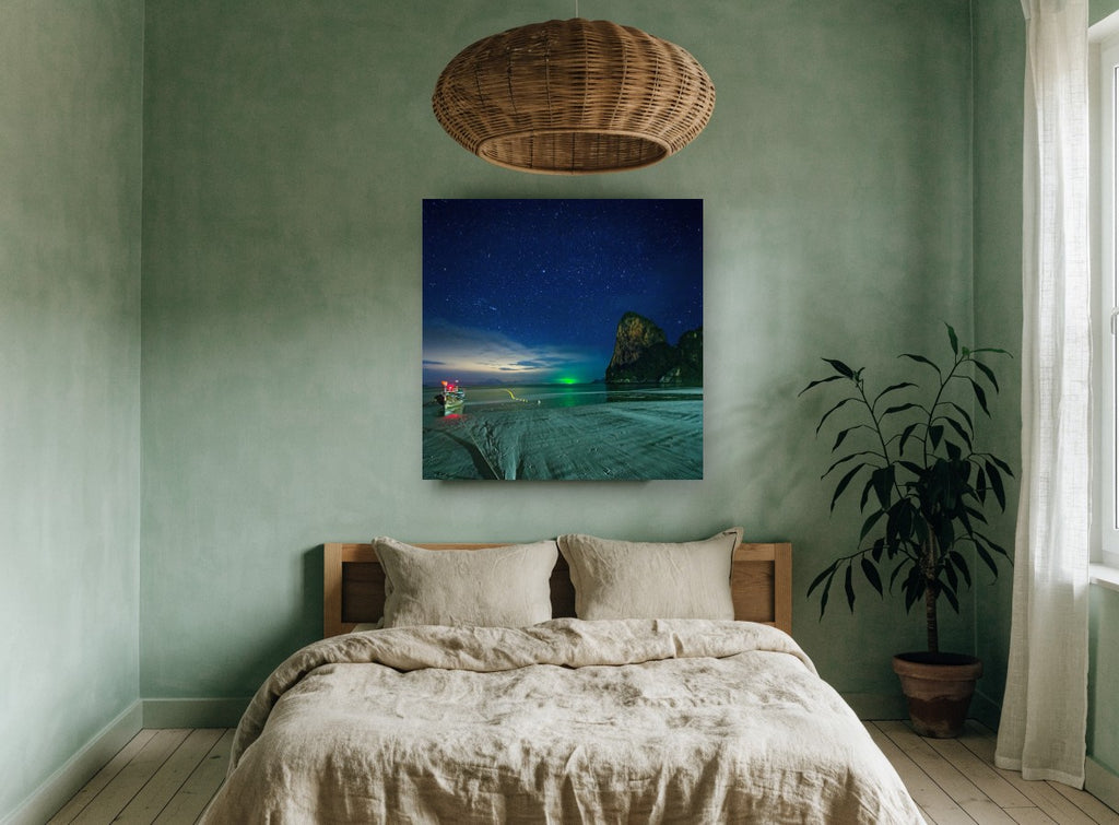Starlit Longtail Bay coastal canvas print on the wall of a bedroom