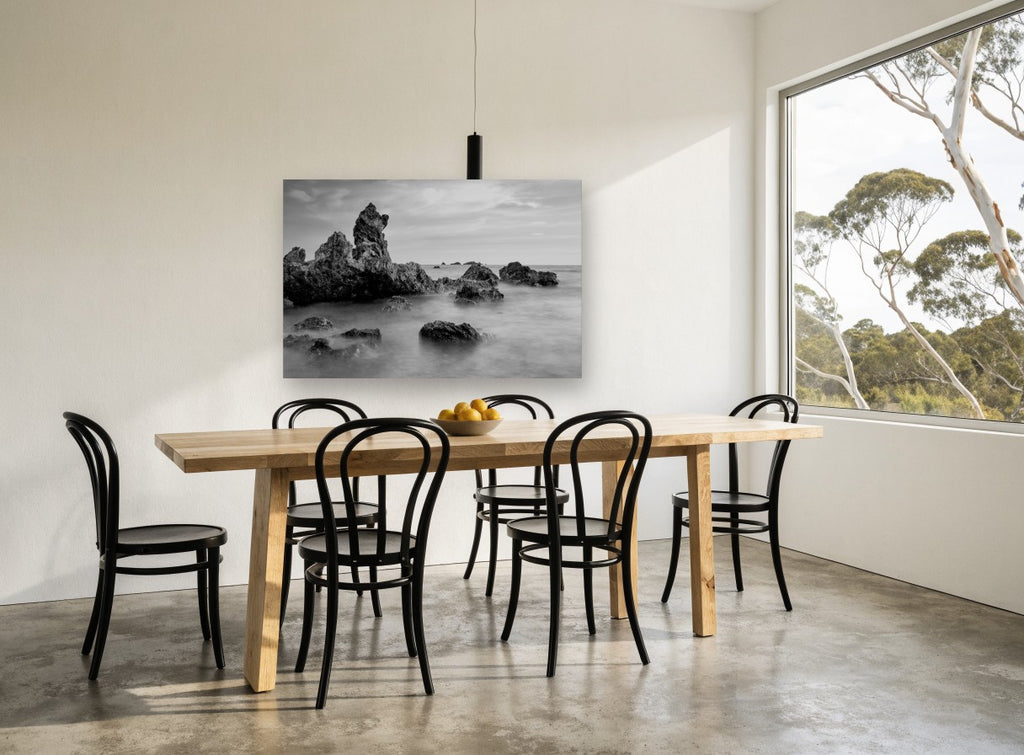 Misted Rock Shore coastal canvas print on the wall of a dining room