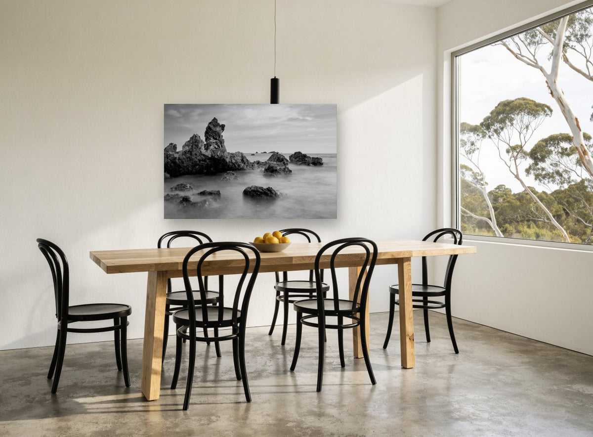Misted Rock Shore coastal canvas print on the wall of a dining room