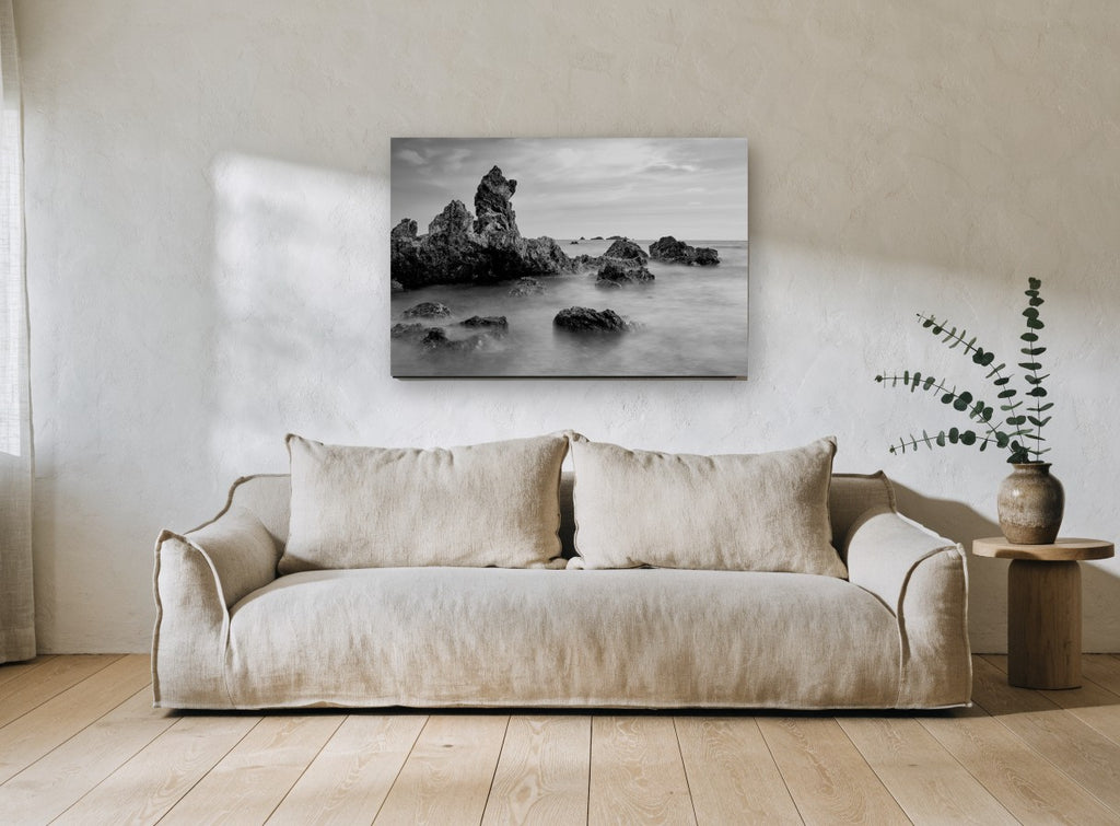 Misted Rock Shore coastal canvas print on the wall of a living room