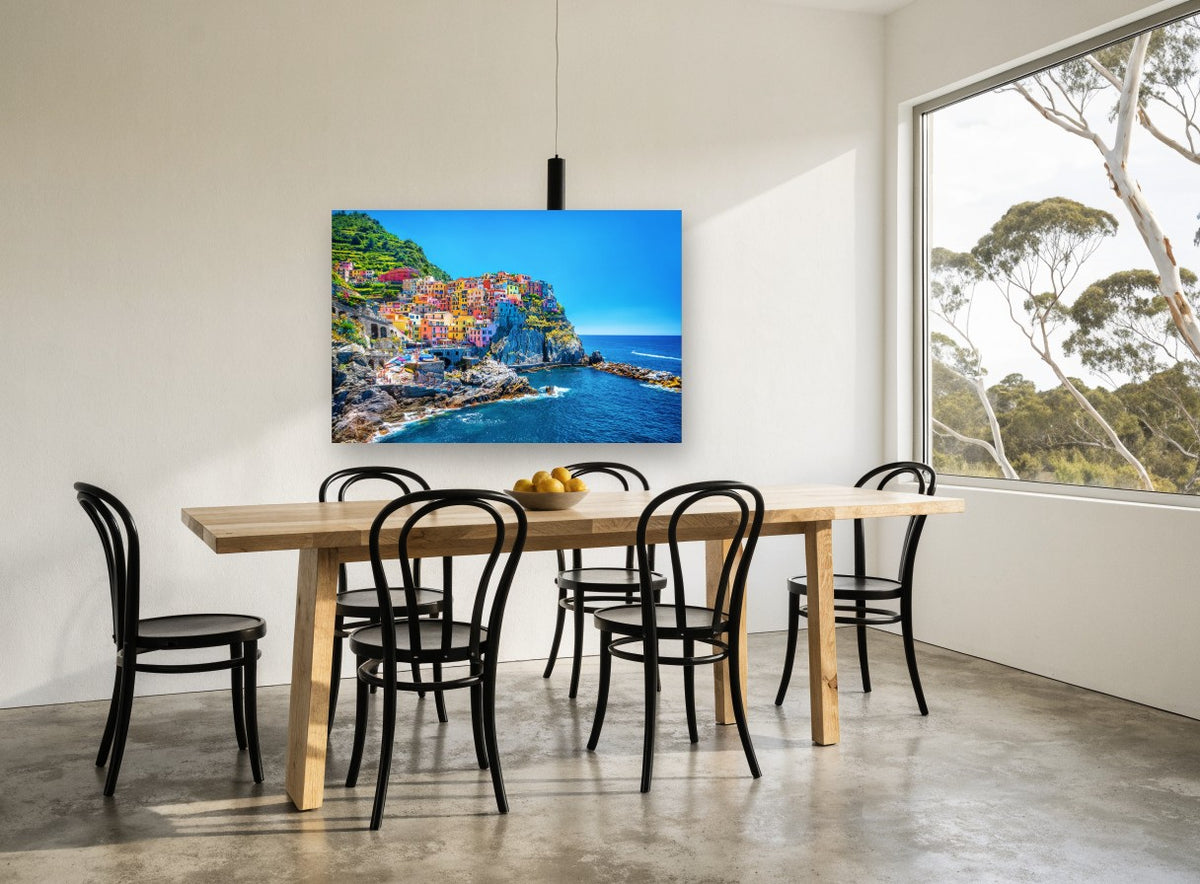 Cinque Terre Cliffside Village coastal canvas print on the wall of a dining room