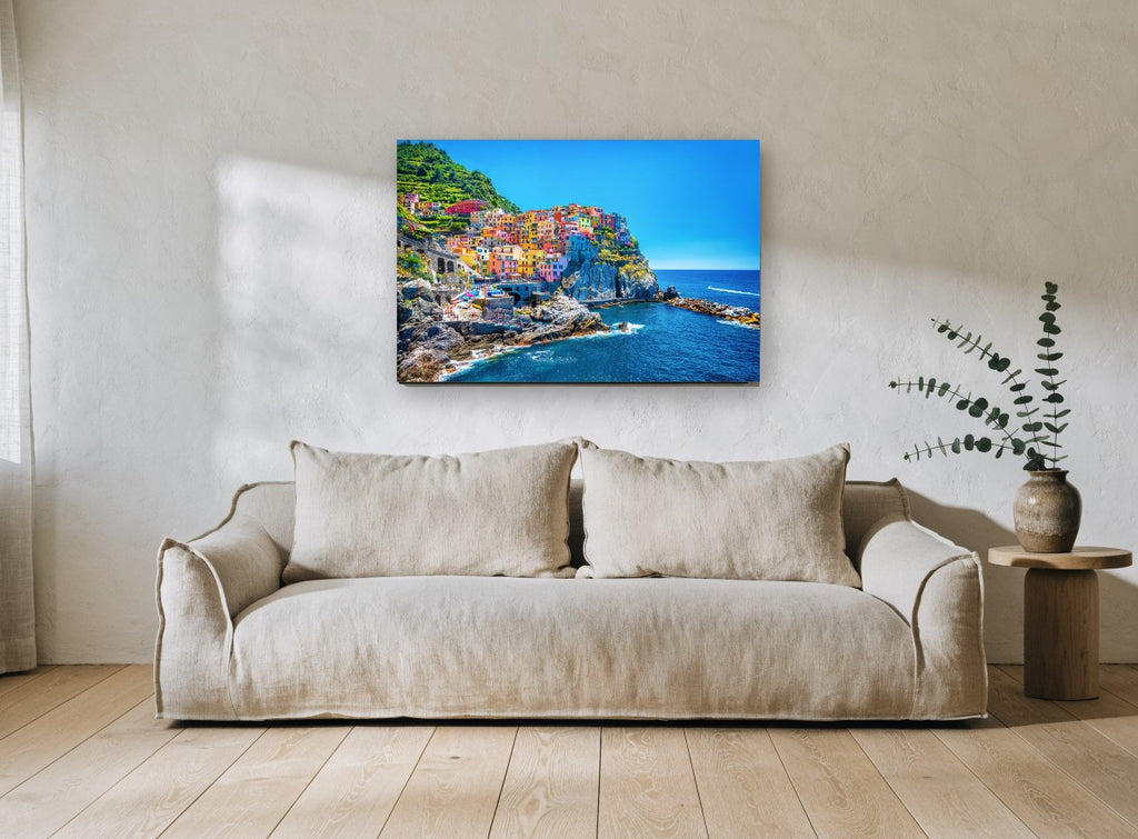 Cinque Terre Cliffside Village coastal canvas print on the wall of a living room