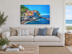 Cinque Terre Cliffside Village coastal canvas print on the wall of a beach house living room