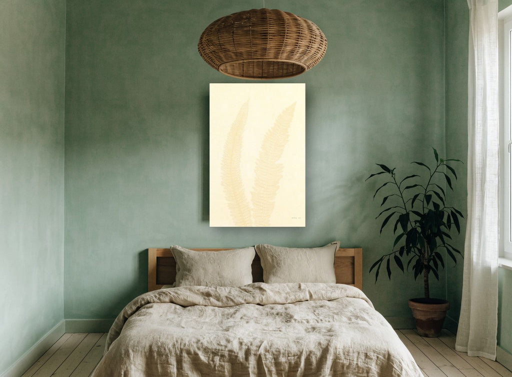 Pale Cream Fern Pair floral canvas print on the wall of a bedroom
