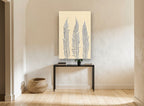 Three Fern Fronds floral canvas print on the wall of a hallway