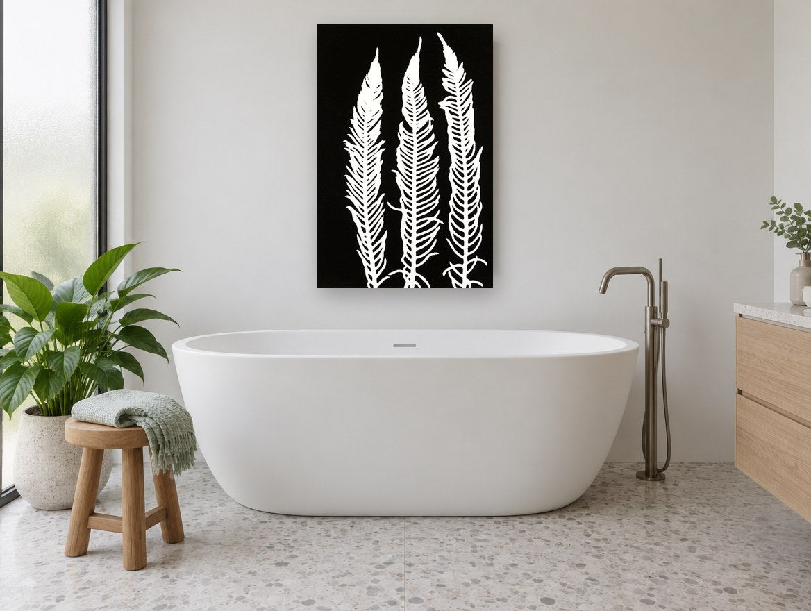 Three White Fern Fronds floral canvas print on the wall of a bathroom