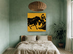 Ochre Bull and Matador animal canvas print on the wall of a bedroom