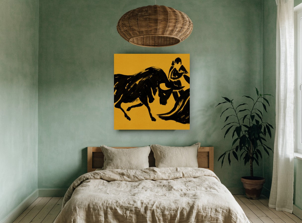 Ochre Bull and Matador animal canvas print on the wall of a bedroom