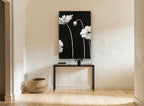 Pale Poppies at Night floral canvas print on the wall of a hallway