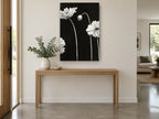Pale Poppies at Night floral canvas print on the wall of a entry hall