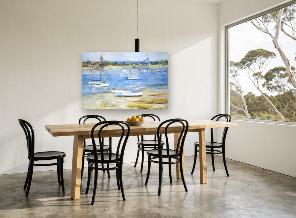 Low Tide Moorings coastal canvas print on the wall of a dining room