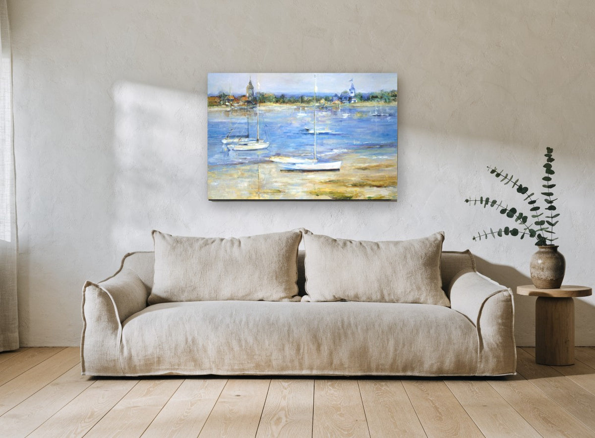 Low Tide Moorings coastal canvas print on the wall of a living room