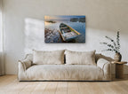 Weathered Rowboat Dawn landscape canvas print on the wall of a living room