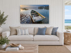 Weathered Rowboat Dawn landscape canvas print on the wall of a beach house living room