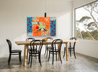 Lovebirds on Orange floral canvas print on the wall of a dining room