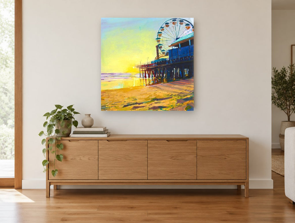 Golden Hour Pier coastal canvas print on the wall of a living room above a sideboard
