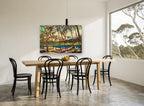 Palm Shade Outrigger coastal canvas print on the wall of a dining room