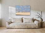 Striped Huts on Sunny Sand coastal canvas print on the wall of a living room