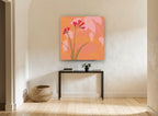 Coral Freesia Silhouette floral canvas print on the wall of a hallway