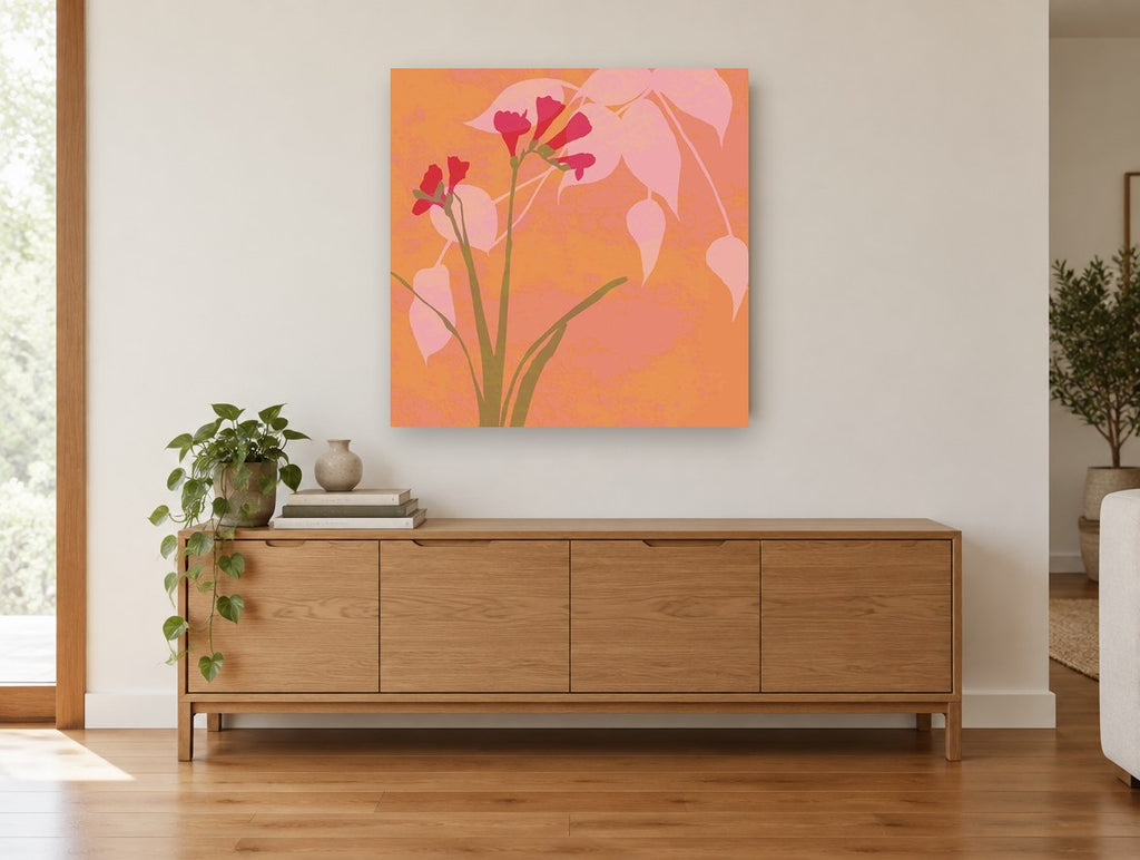 Coral Freesia Silhouette floral canvas print on the wall of a living room above a sideboard