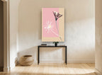 Two Daisies on Blush floral canvas print on the wall of a hallway