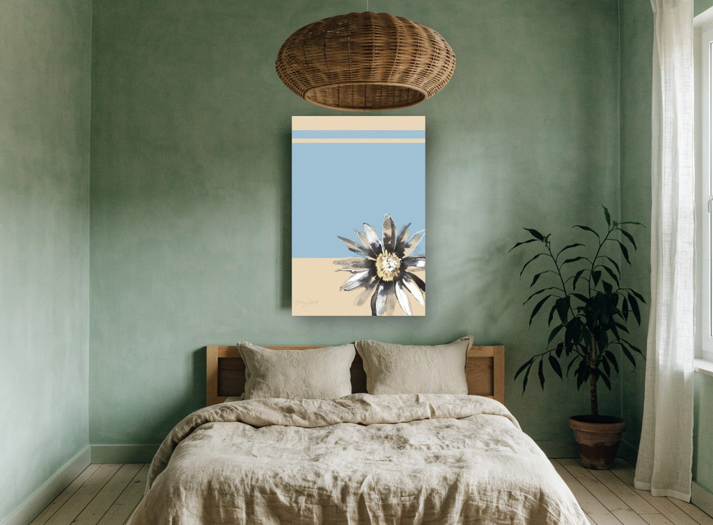 Ink Daisy on Blue floral canvas print on the wall of a bedroom