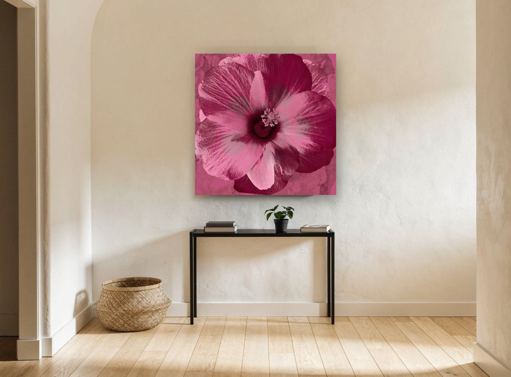 Magenta Hibiscus Bloom floral canvas print on the wall of a hallway