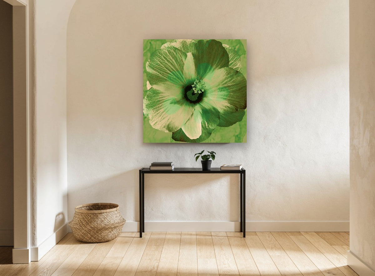 Green Hibiscus Bloom floral canvas print on the wall of a hallway