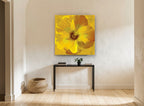 Golden Hibiscus Bloom floral canvas print on the wall of a hallway