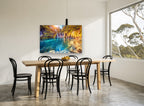 Turquoise Falls Sunburst landscape canvas print on the wall of a dining room